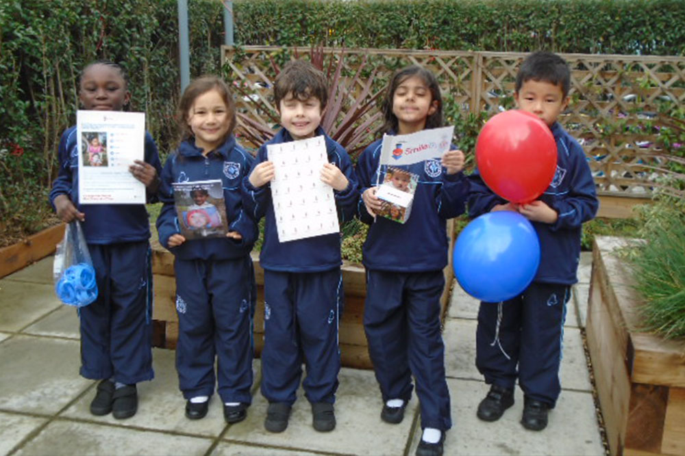 Avenue House School Kids with Smile Train gear