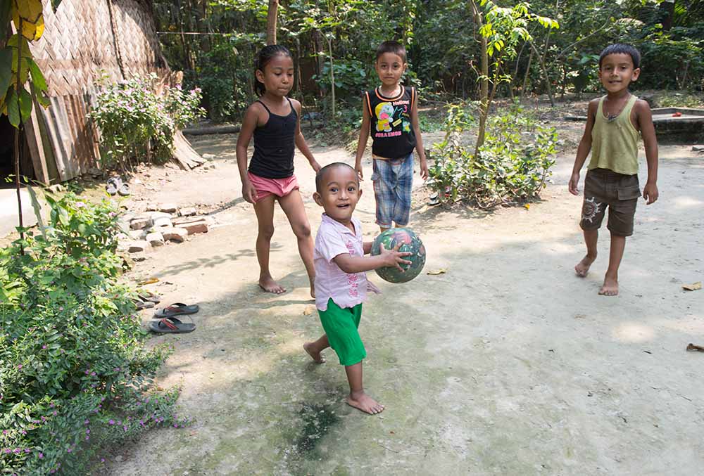 Badhon plays ball with friends