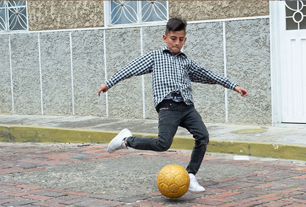 Cristian playing futbol