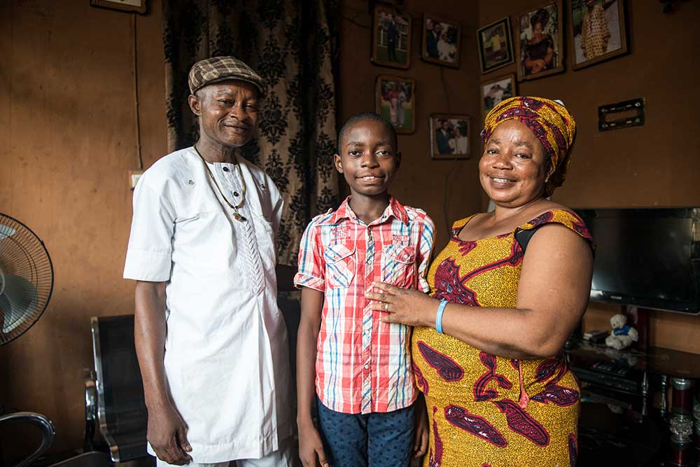 Ebuka next to his mom and dad