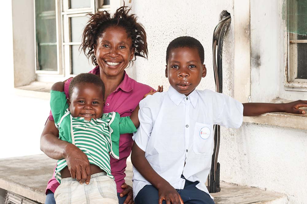 Nkunda with his mother and sibling