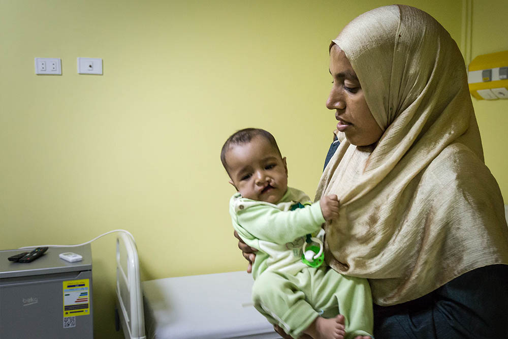 Rawda in her mothers arms