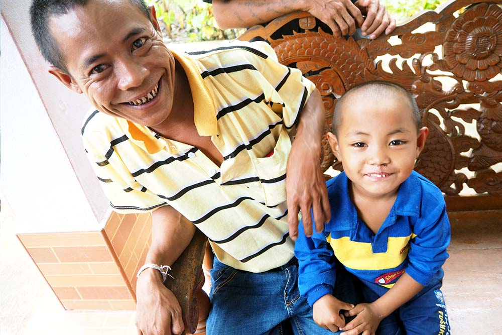 Shan after surgery with his dad