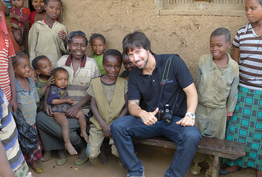 Troy visiting patients in Nigeria