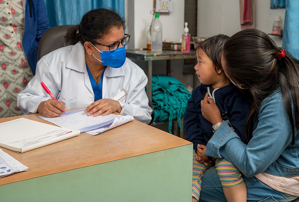 Dr Neela examines a cleft patient