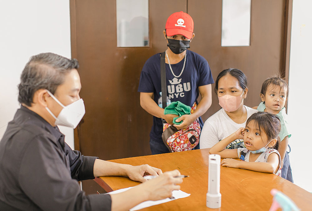 Ernie and Ermalen undergoing a pre-surgical consultation at Philippine Band of Mercy