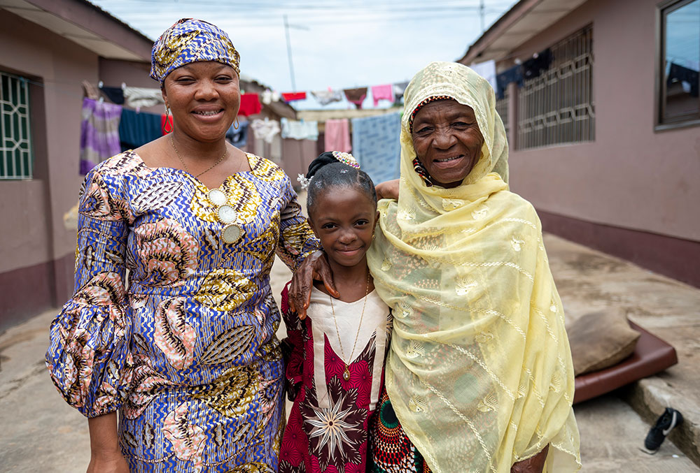 Rawdah (centre) with her mother and grandmother