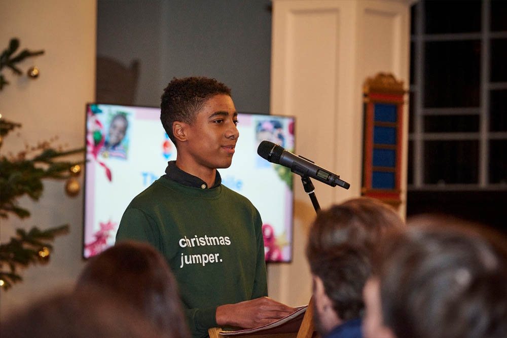 Elouan telling a story at Grosvenor Chapel