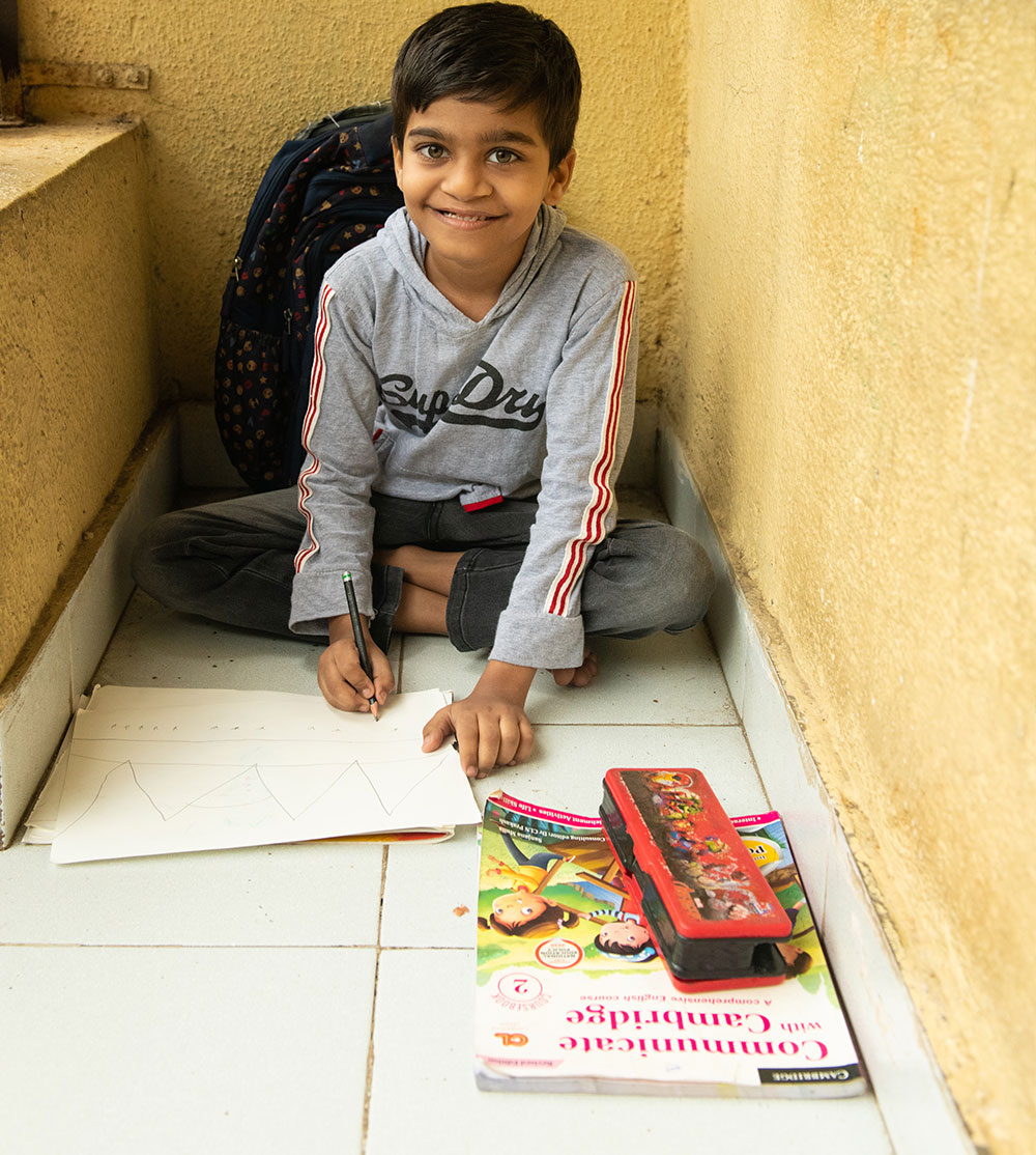 Samrat smiling and colouring