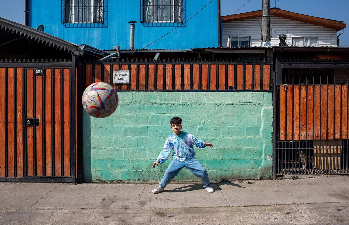 Joaquin defending the goal in a neighbourhood football game