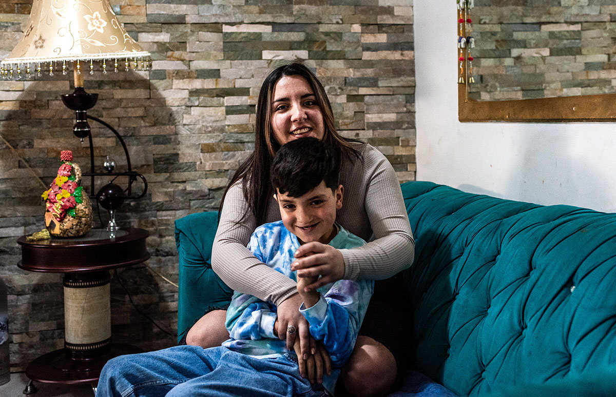 Joaquin and his mother share a smile