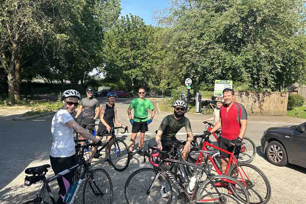 Members of DHA Planning posing with their bikes