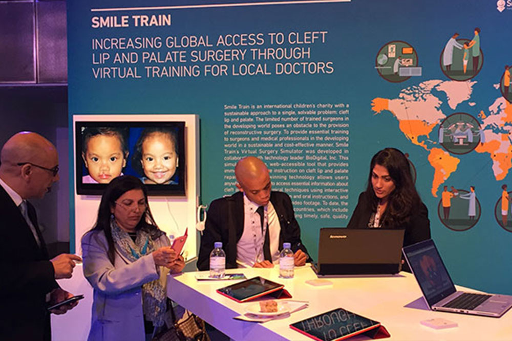 Priya educating about Smile Train at our booth at a conference
