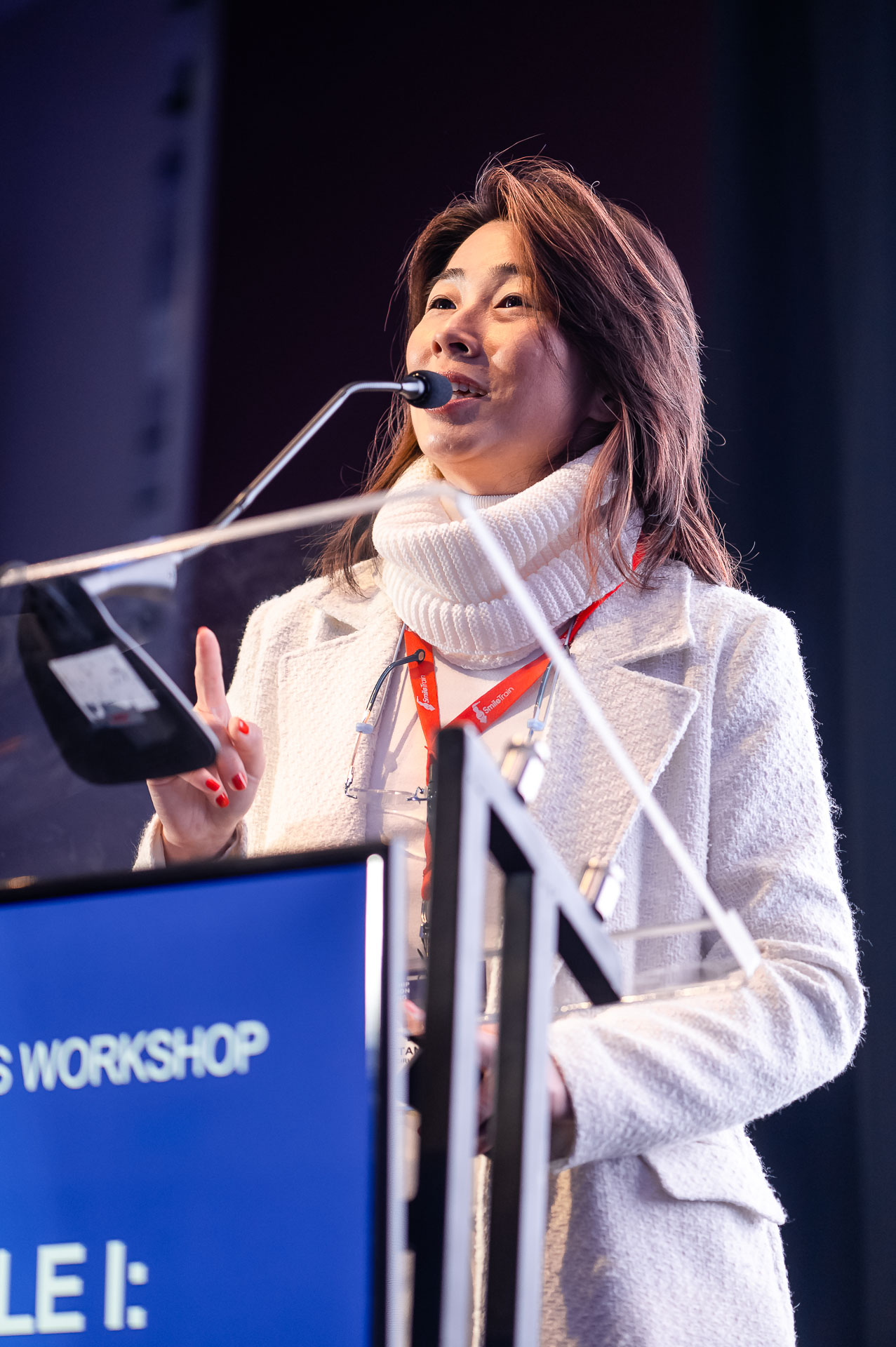 Dr Daniela Tanikawa speaking at a podium