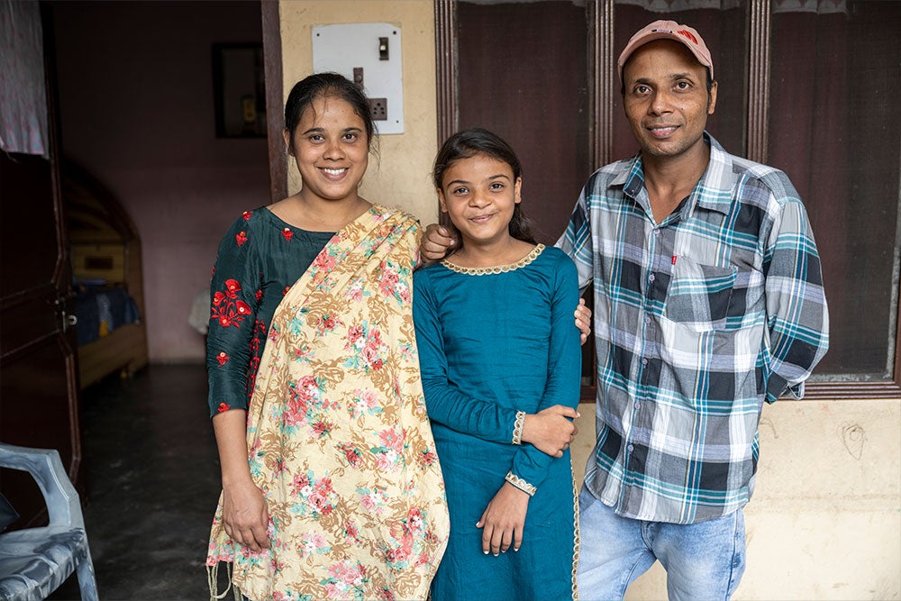 Paulwin with her parents