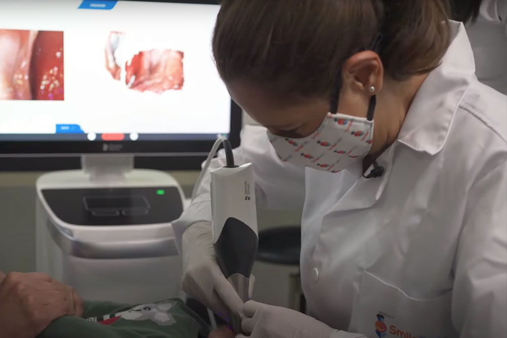 A baby receiving an intraoral scan at a Smile Train partner cleft treatment centre in Colombia