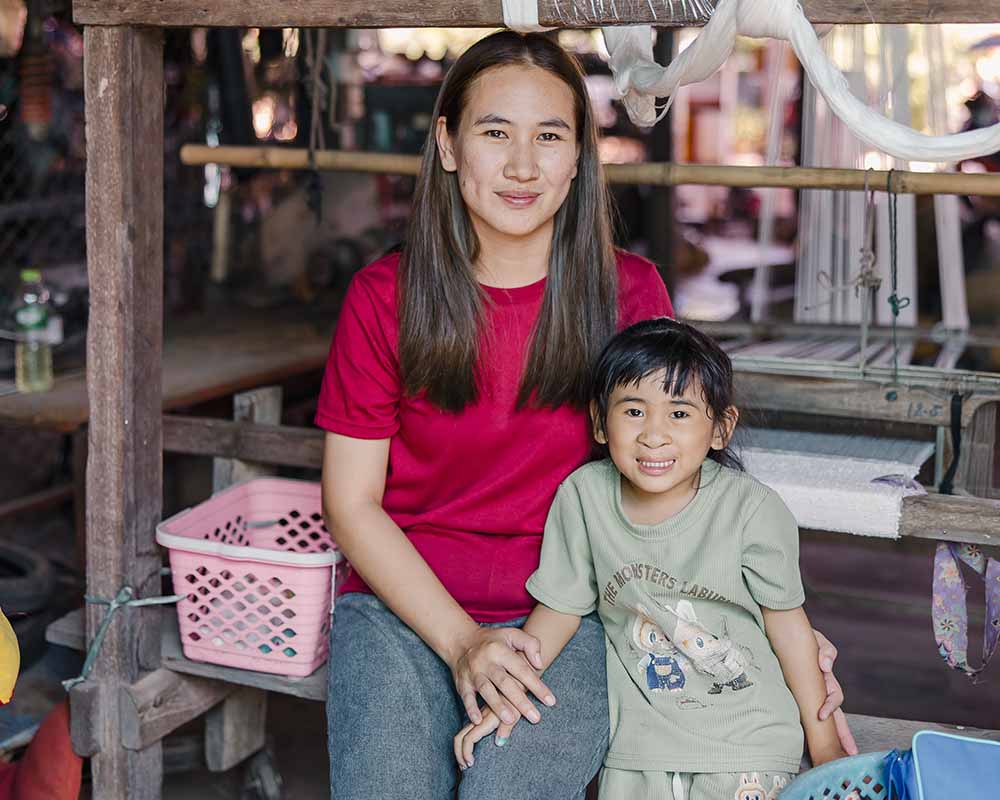 Niu smiling with her mother Patchaiakotsopa after cleft surgery