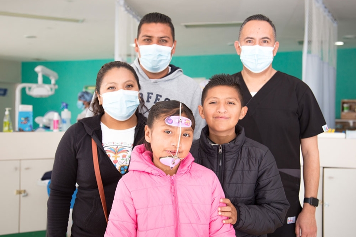 Alex and Kendra with their parents and Dr Varela 