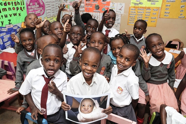 livingstone in class holding before image