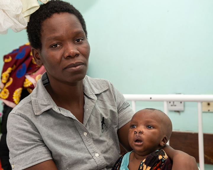 Mariam holding Shadrack