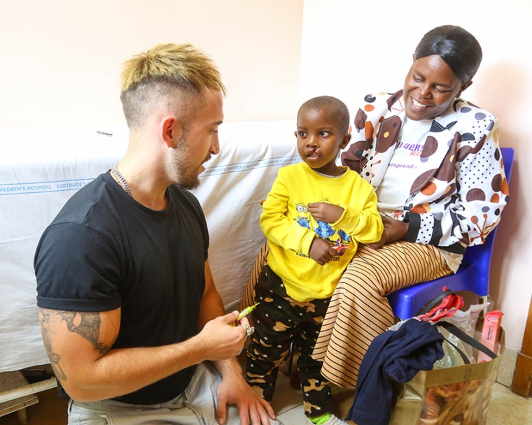 Nathan with Smile Train patient before his surgery in Kenya