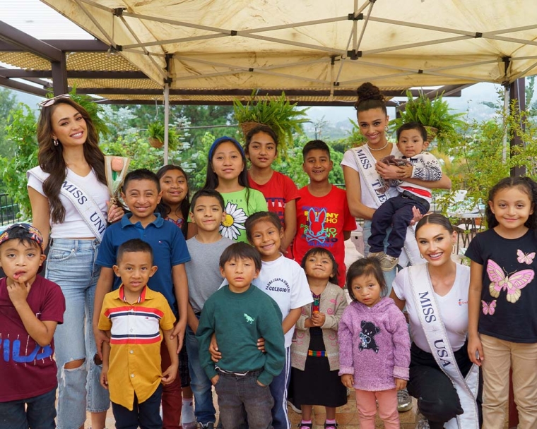 Miss Universe Organization smiling with Smile Train patients
