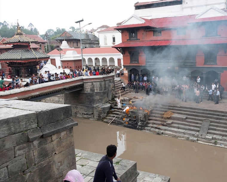 A religious ritual beside a river