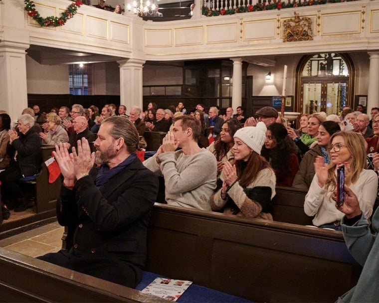 Big Smile Choir Concert participants applauding