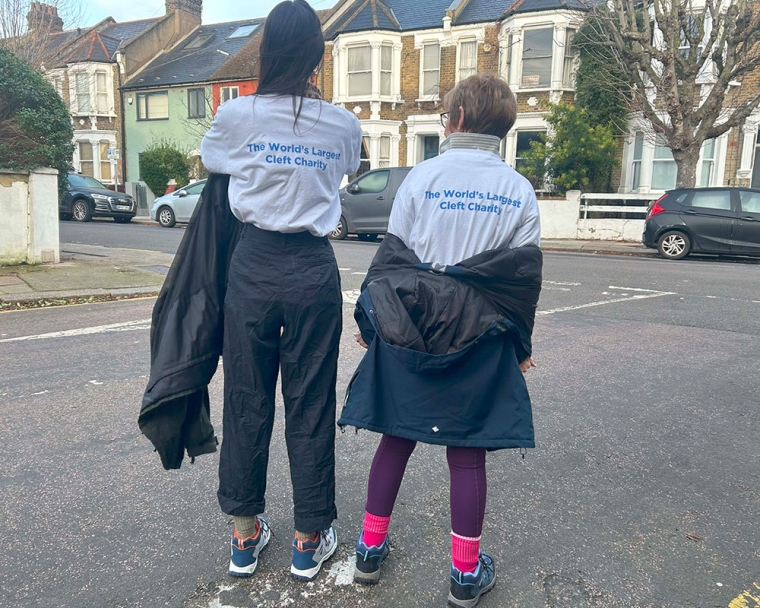 Emily Stott and her mother standing with Smile Train T-shirts