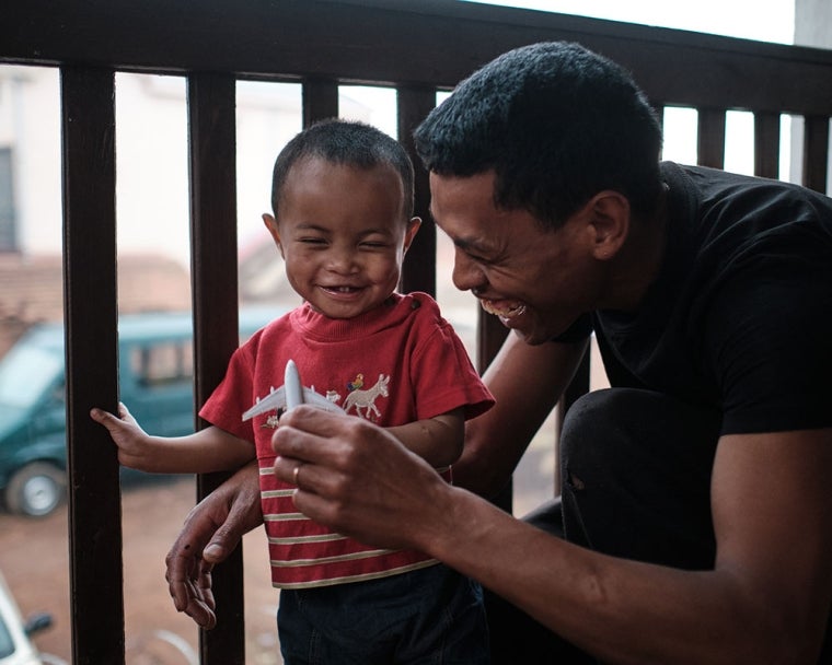 Eden with his father Heriniaina after cleft surgery