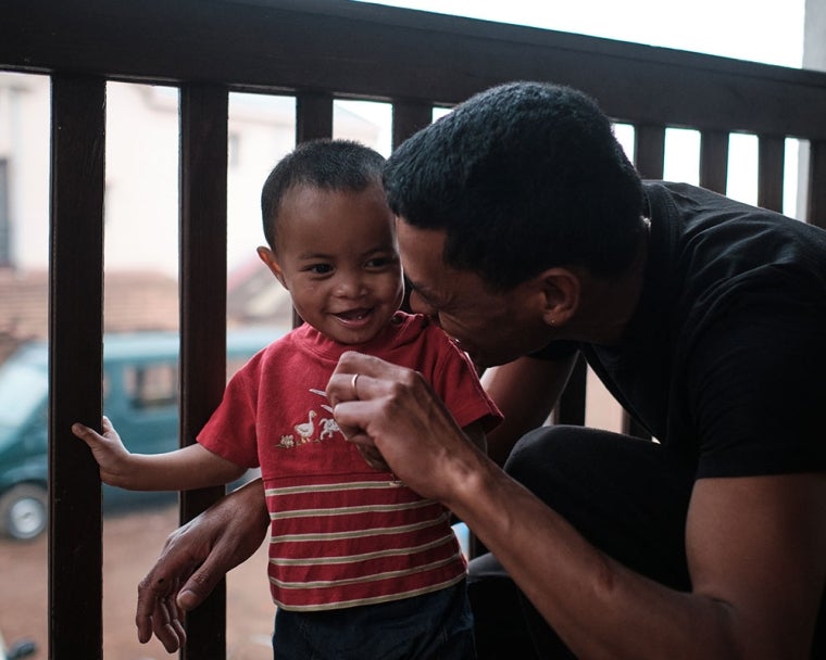 Eden with his father Heriniaina after cleft surgery