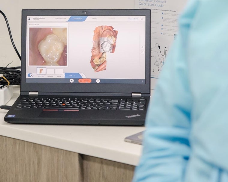 Close-up of dental oral imaging technology on laptop
